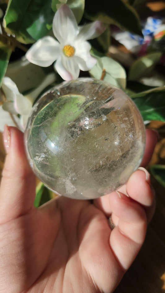Amazing lemurian clear quartz sphere with rainbows and inclusions, from the Tocantins mine in Brazil, authentic lemurian 125L. 64-65mm