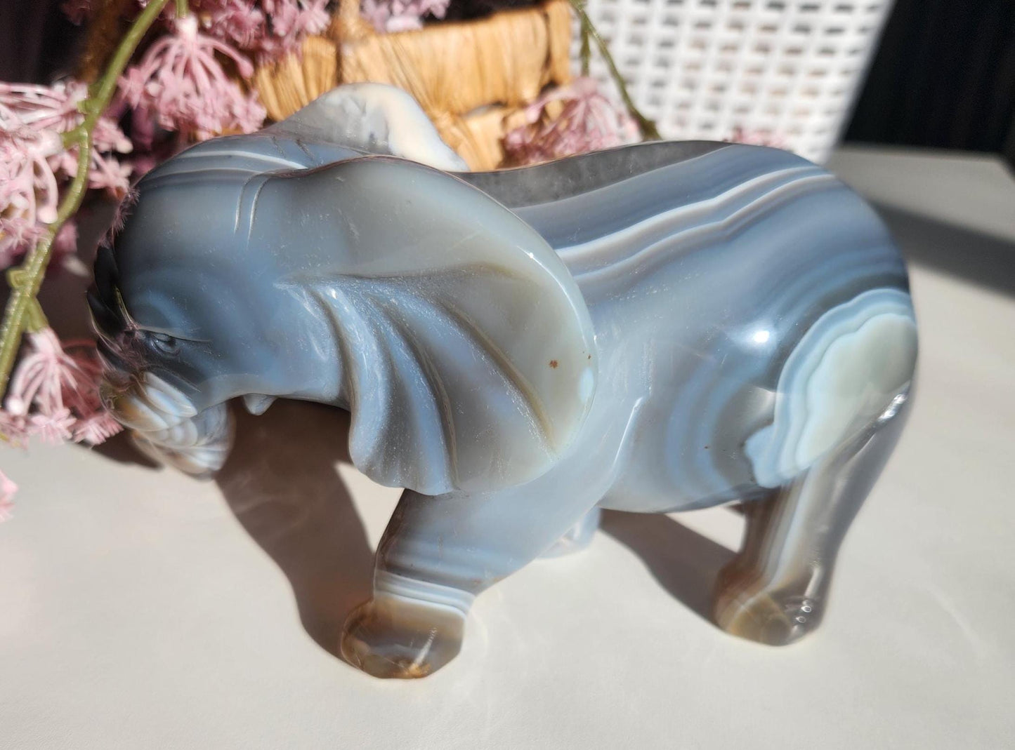Beautiful master hand carved elephant agate with a sparkly white druzy, natural, nice banding, quartz