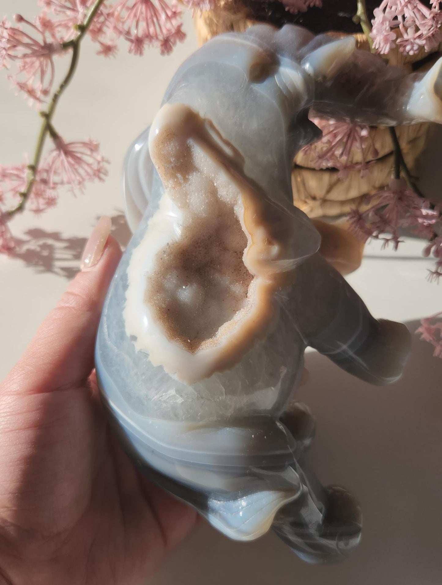 Beautiful master hand carved elephant agate with a sparkly white druzy, natural, nice banding, quartz