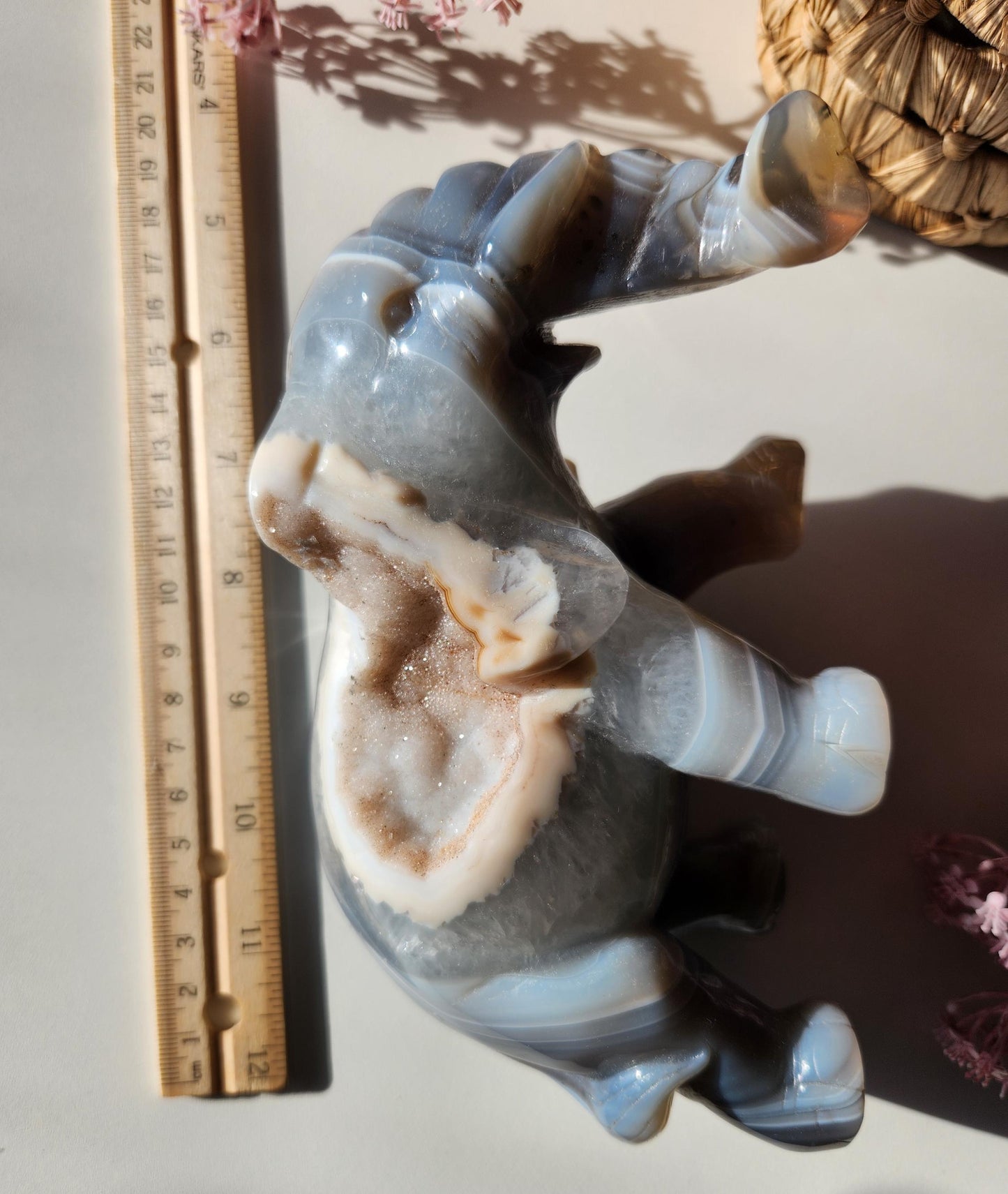 Beautiful master hand carved elephant agate with a sparkly white druzy, natural, nice banding, quartz