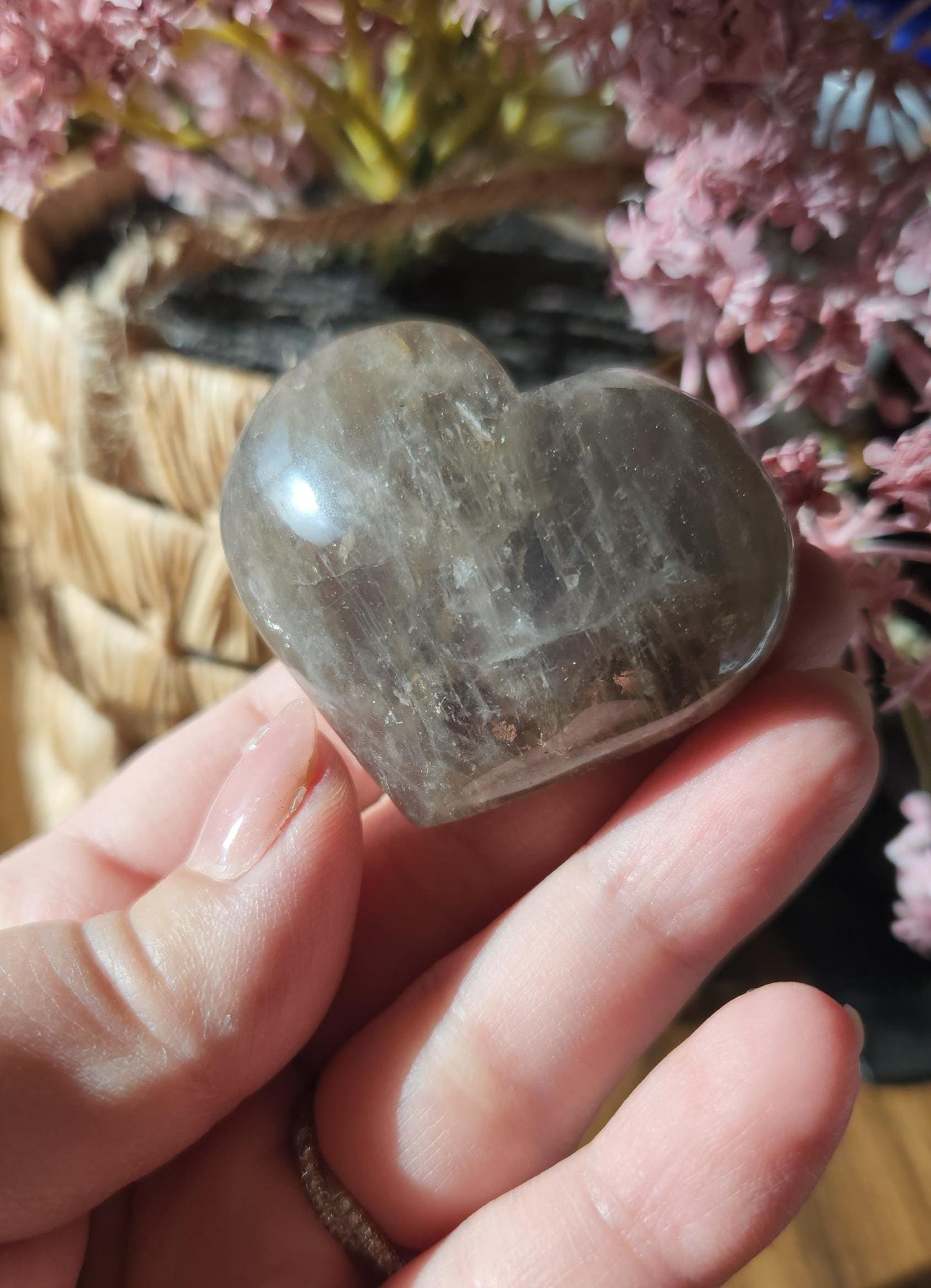 Pretty blue rose quartz heart with inclusions and rainbows