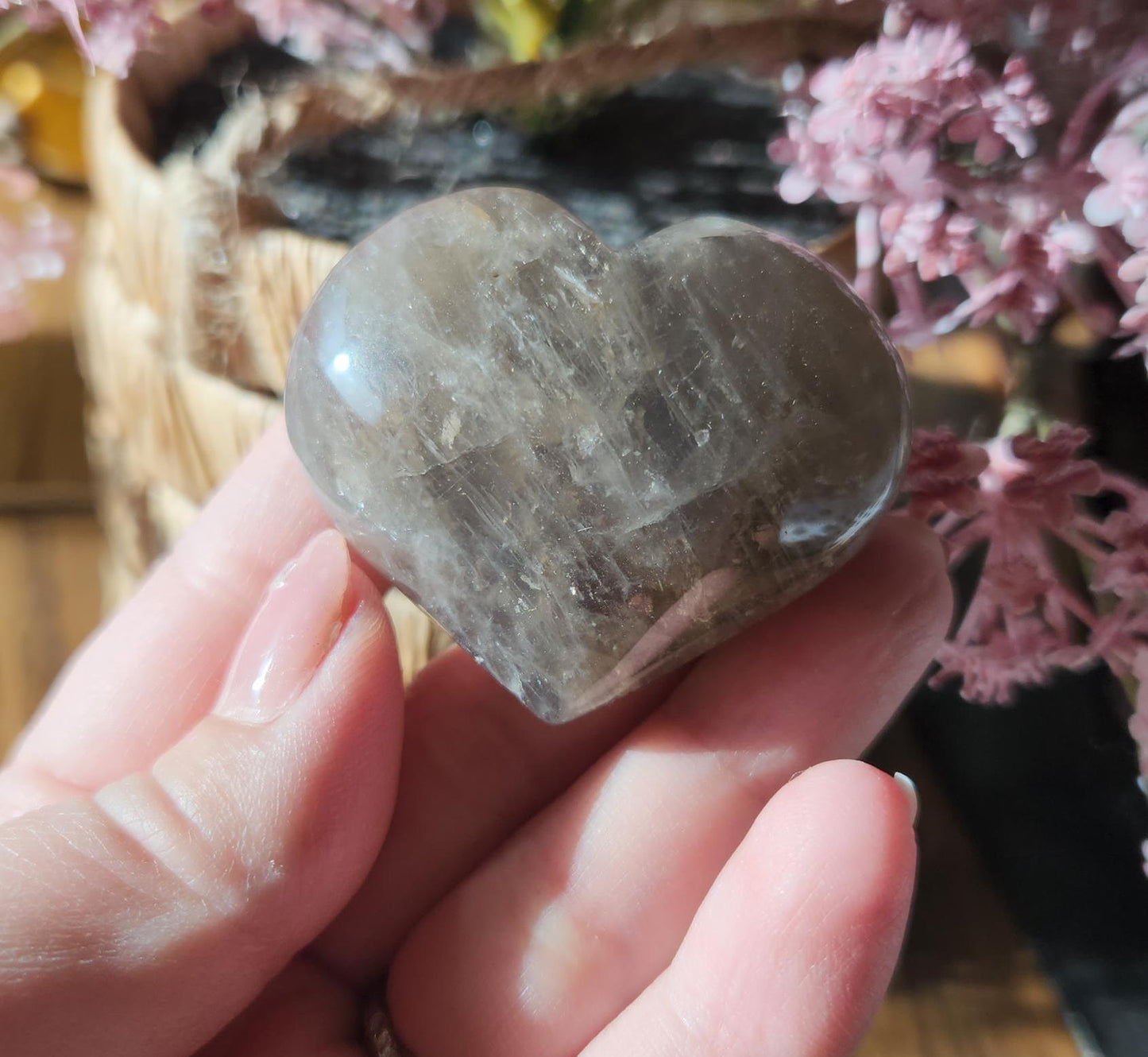 Pretty blue rose quartz heart with inclusions and rainbows