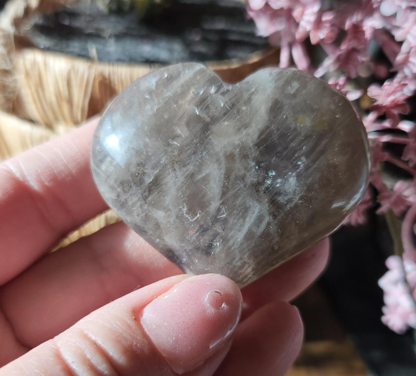Pretty blue rose quartz heart with inclusions and rainbows
