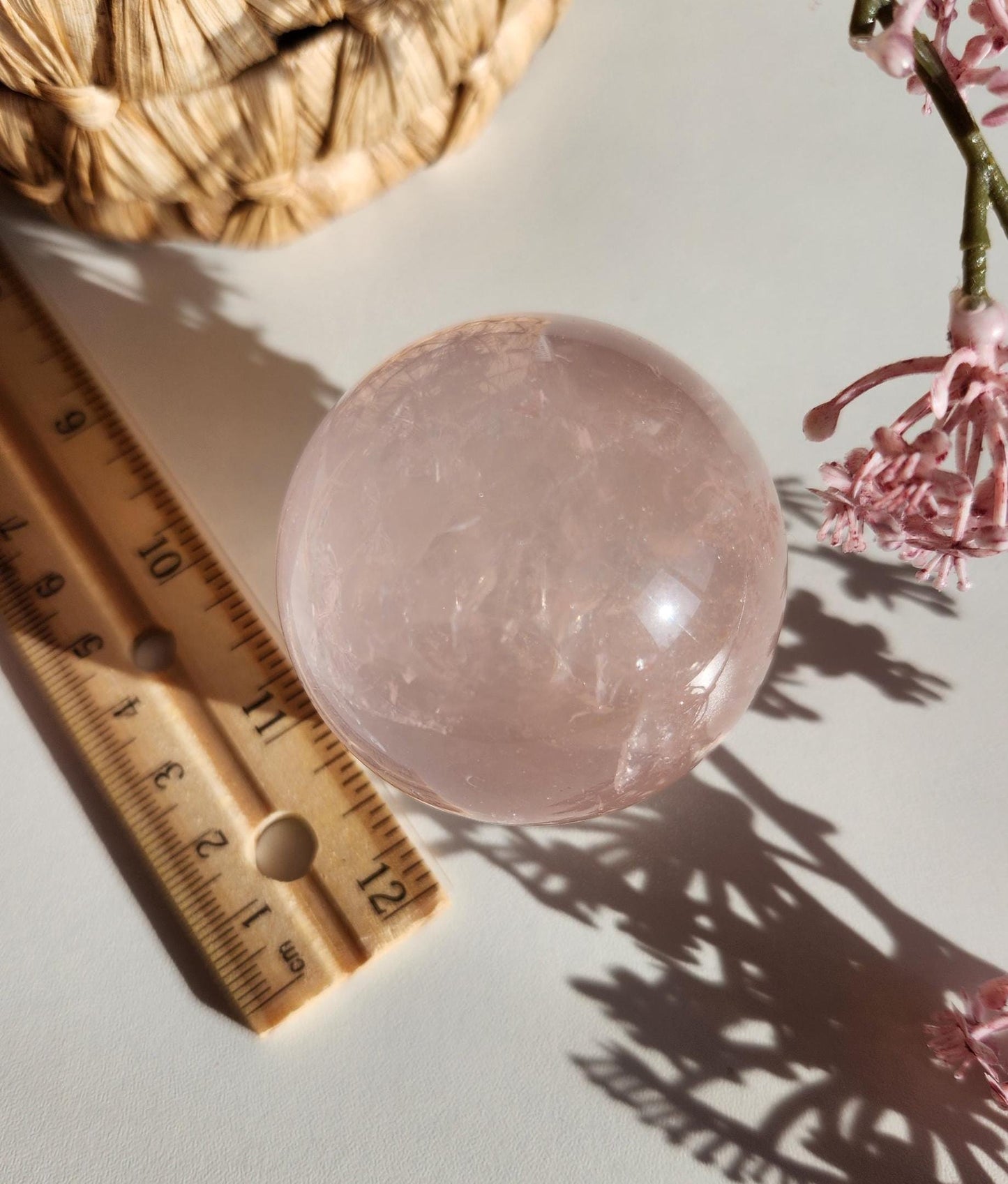 High quality 6 star rose quartz sphere, translucent with inclusions and rainbows from Mozambique  H50