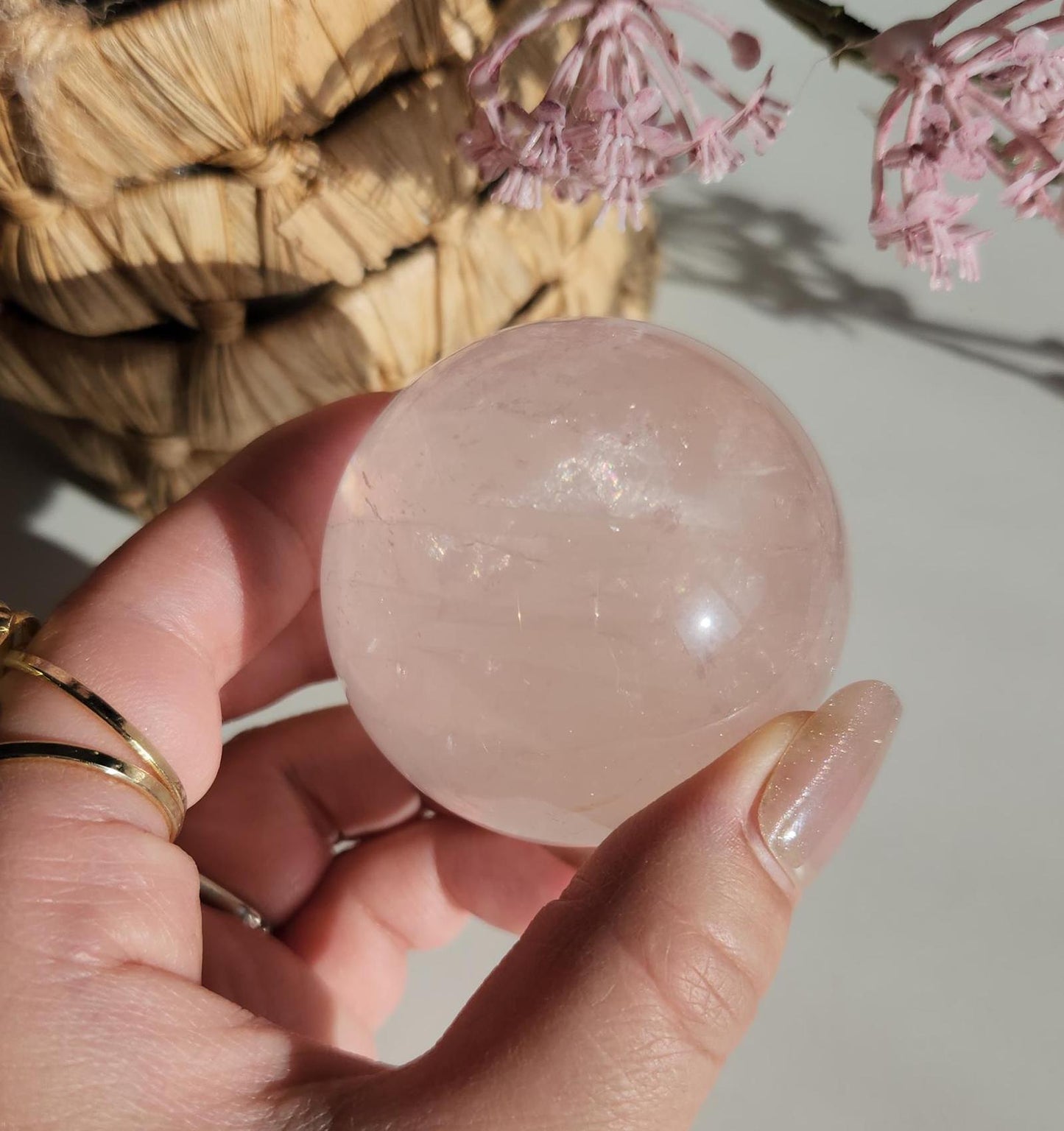 High quality 6 star rose quartz sphere, translucent with inclusions and rainbows from Mozambique  H50