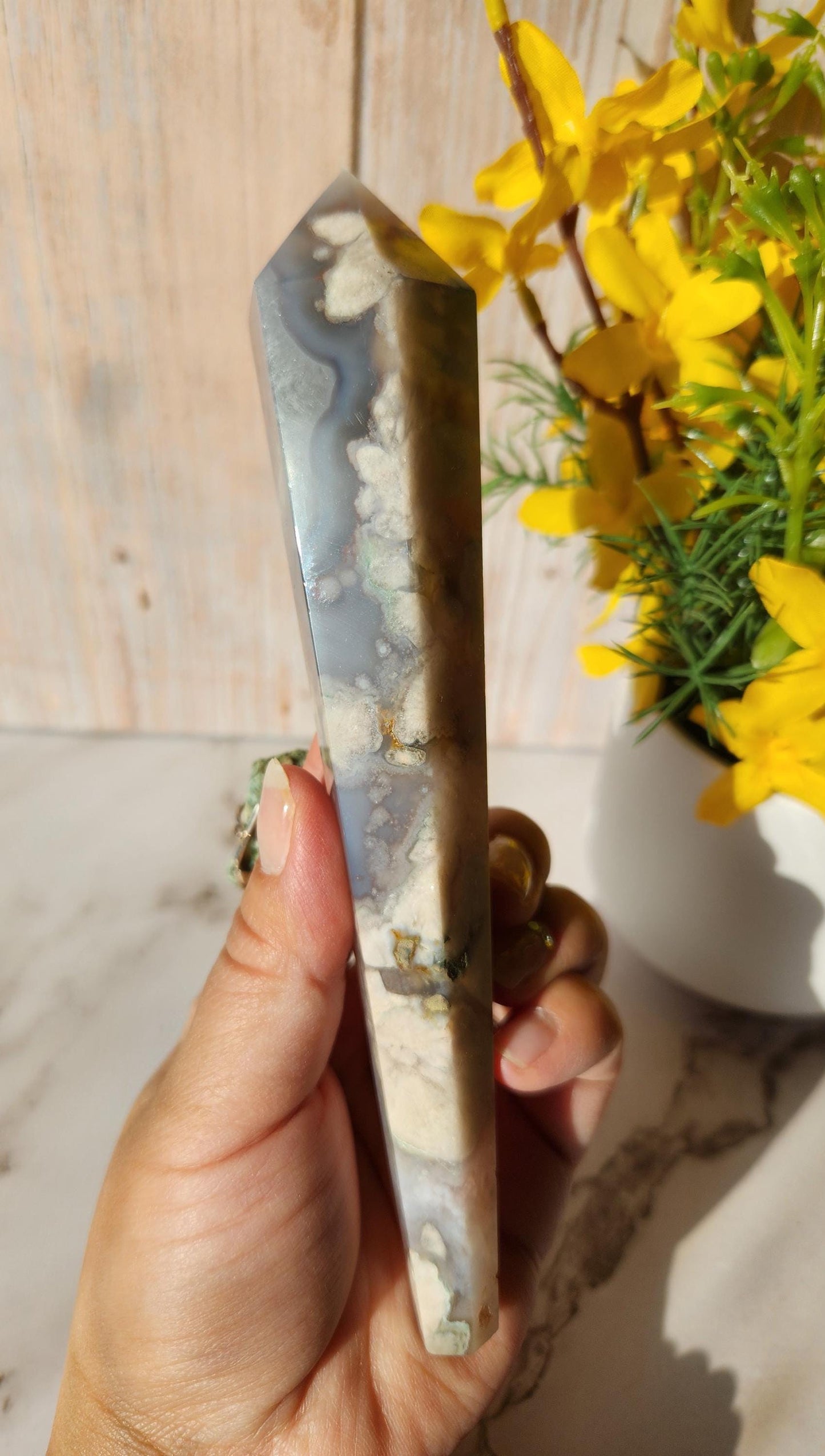 Natural black flower agate wand with stand, has quartz, black chalcedony, a touch of green, and beautiful agate banding from Madagascar