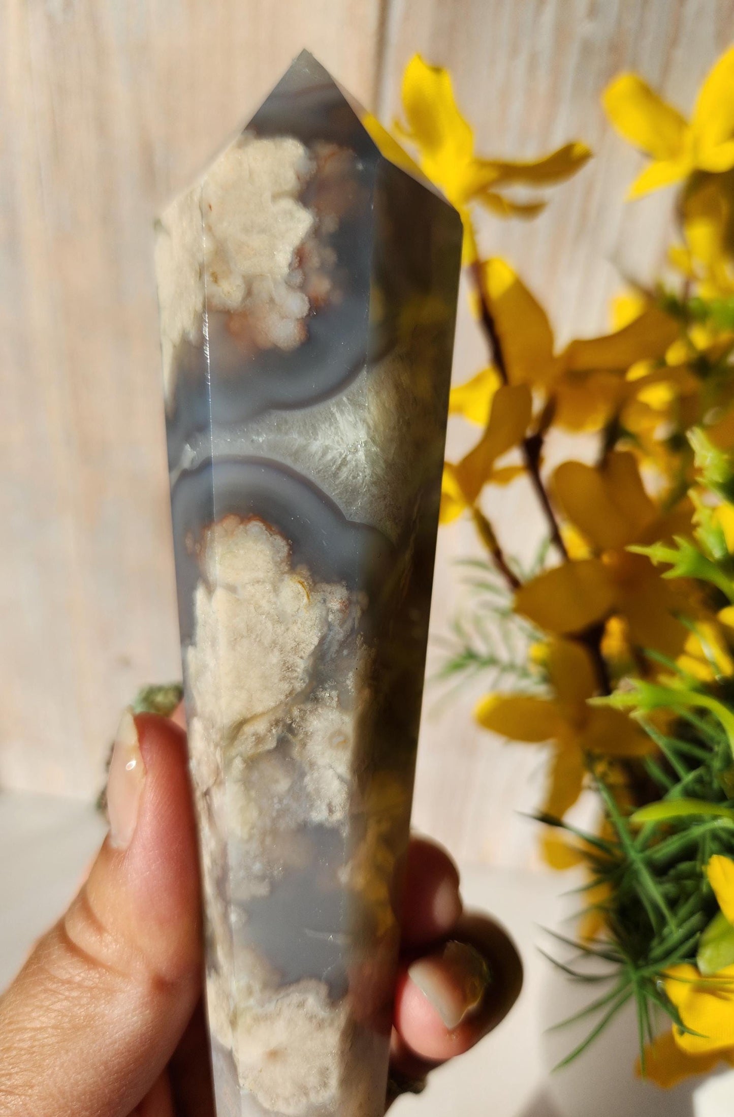 Natural black flower agate wand with stand, has quartz, black chalcedony, a touch of green, and beautiful agate banding from Madagascar