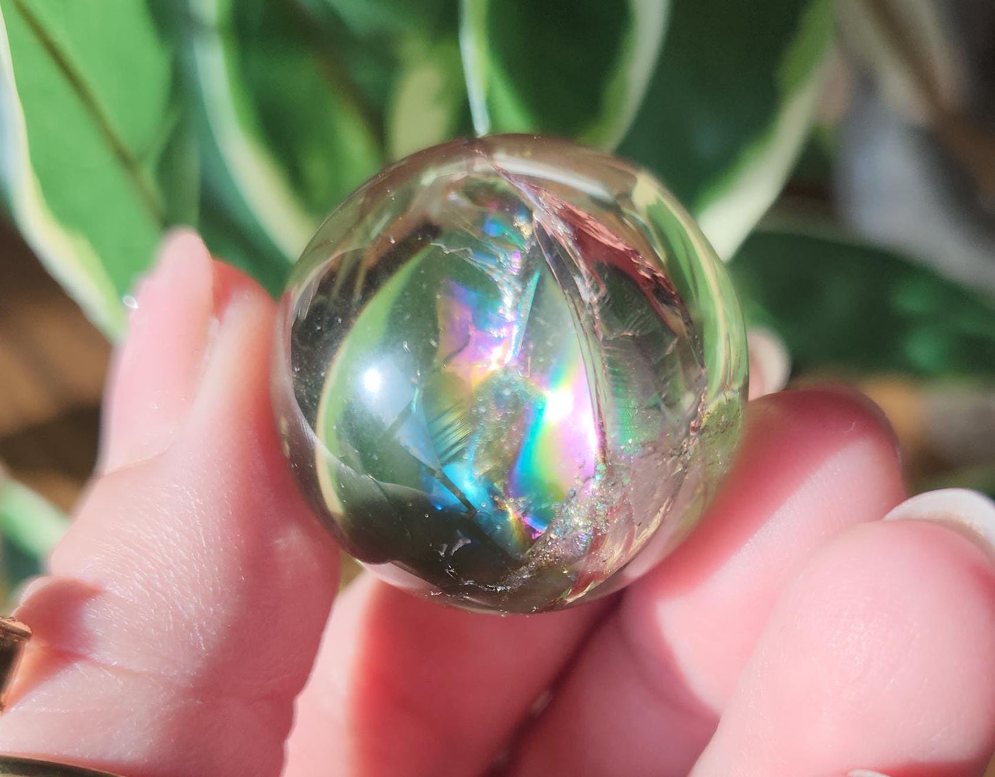 High quality natural light smoky quartz sphere with amazing rainbows