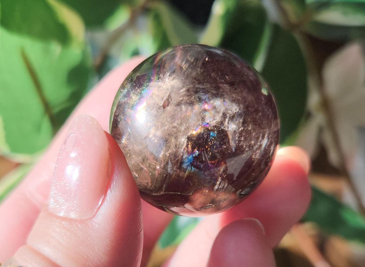 High quality natural dark smoky quartz sphere with amazing rainbows