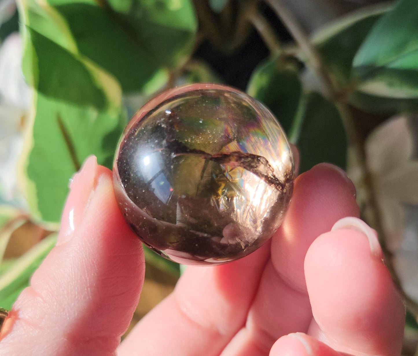 High quality natural dark smoky quartz sphere with amazing rainbows