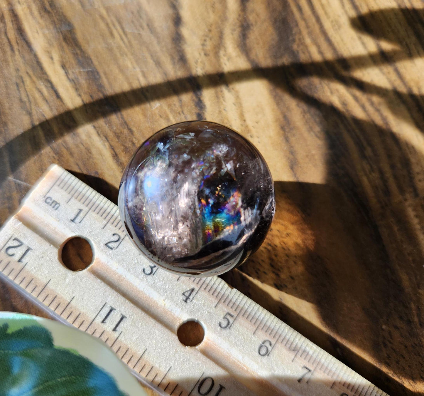 High quality natural dark smoky quartz sphere with amazing rainbows