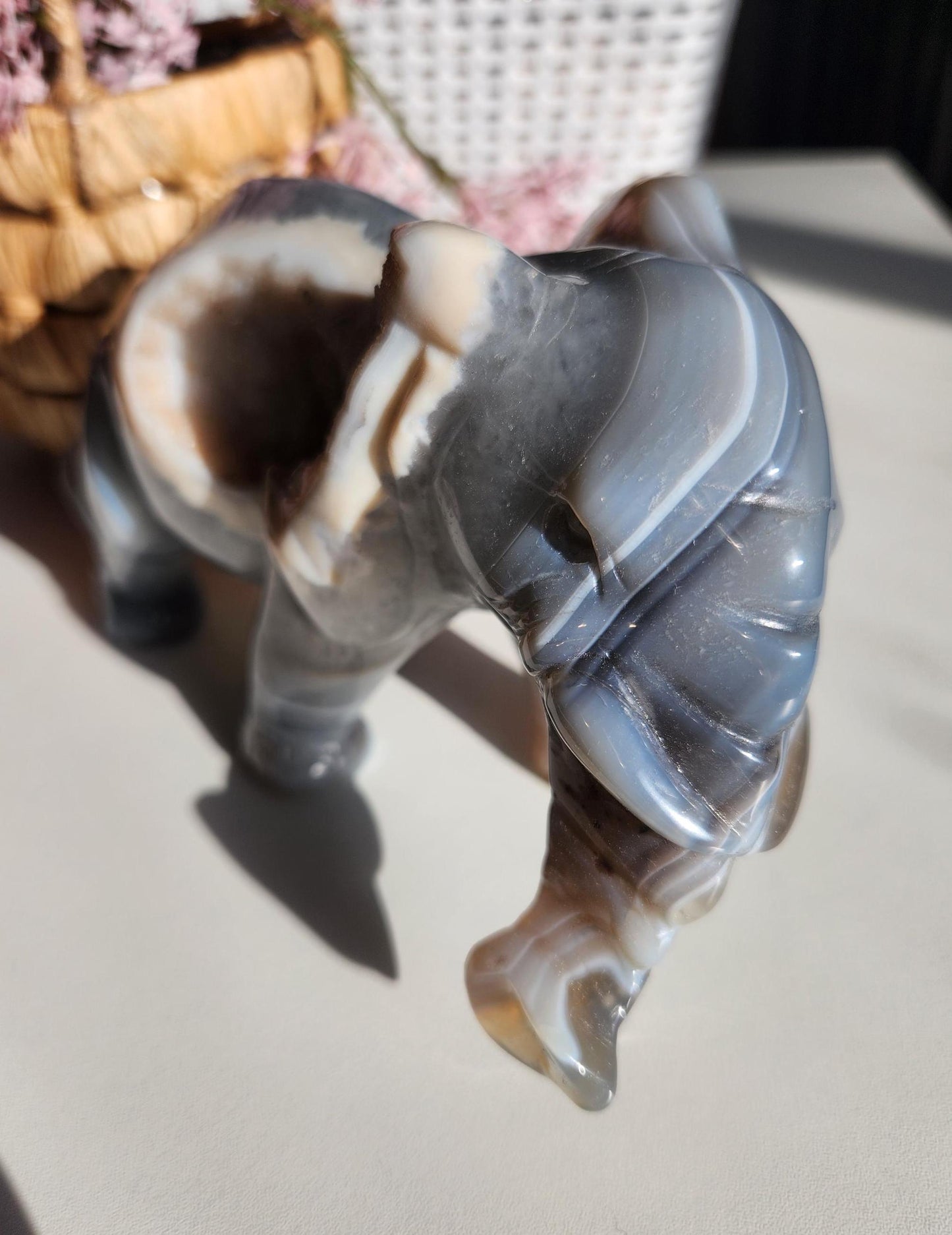 Beautiful master hand carved elephant agate with a sparkly white druzy, natural, nice banding, quartz