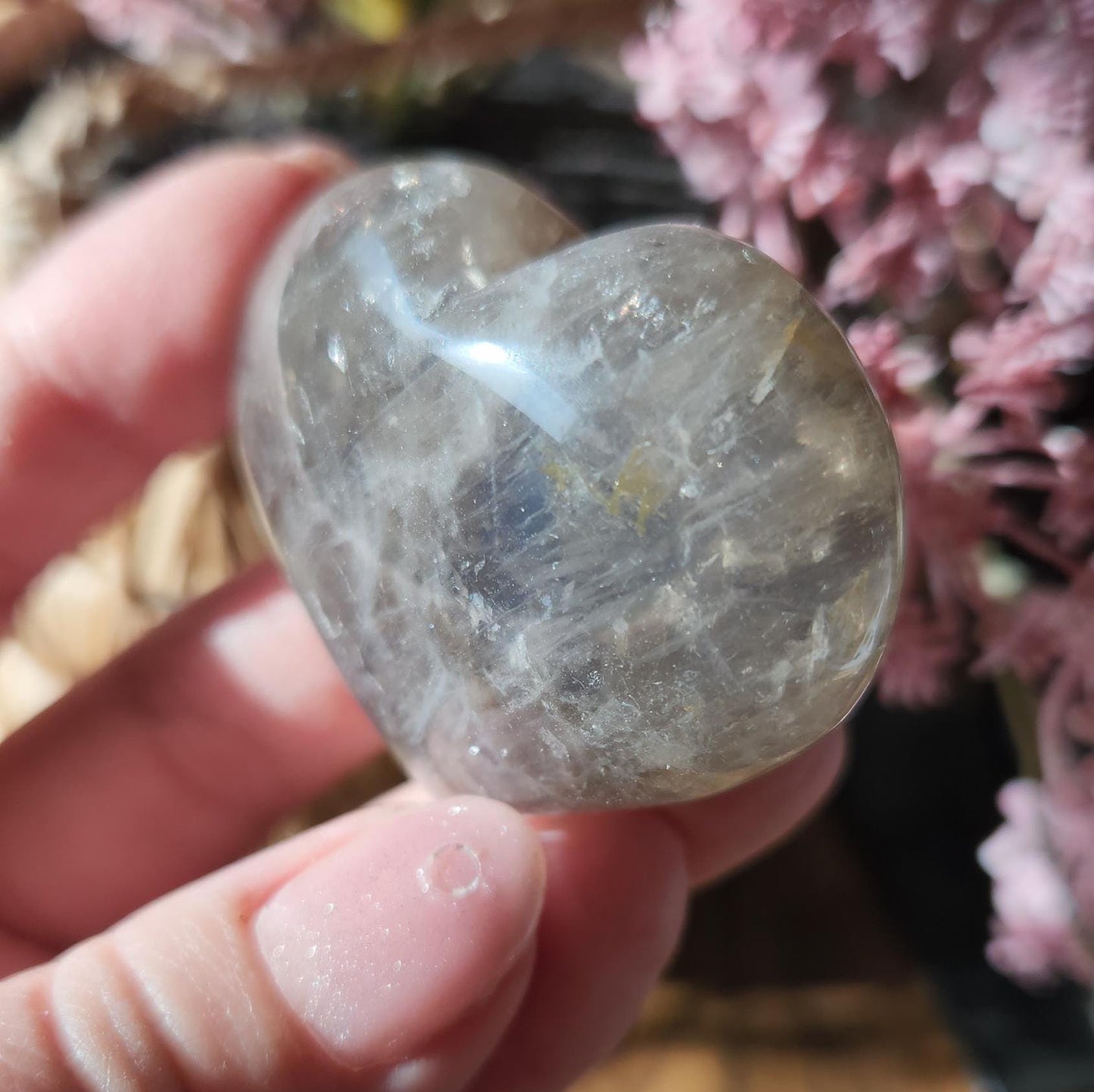 Pretty blue rose quartz heart with inclusions and rainbows