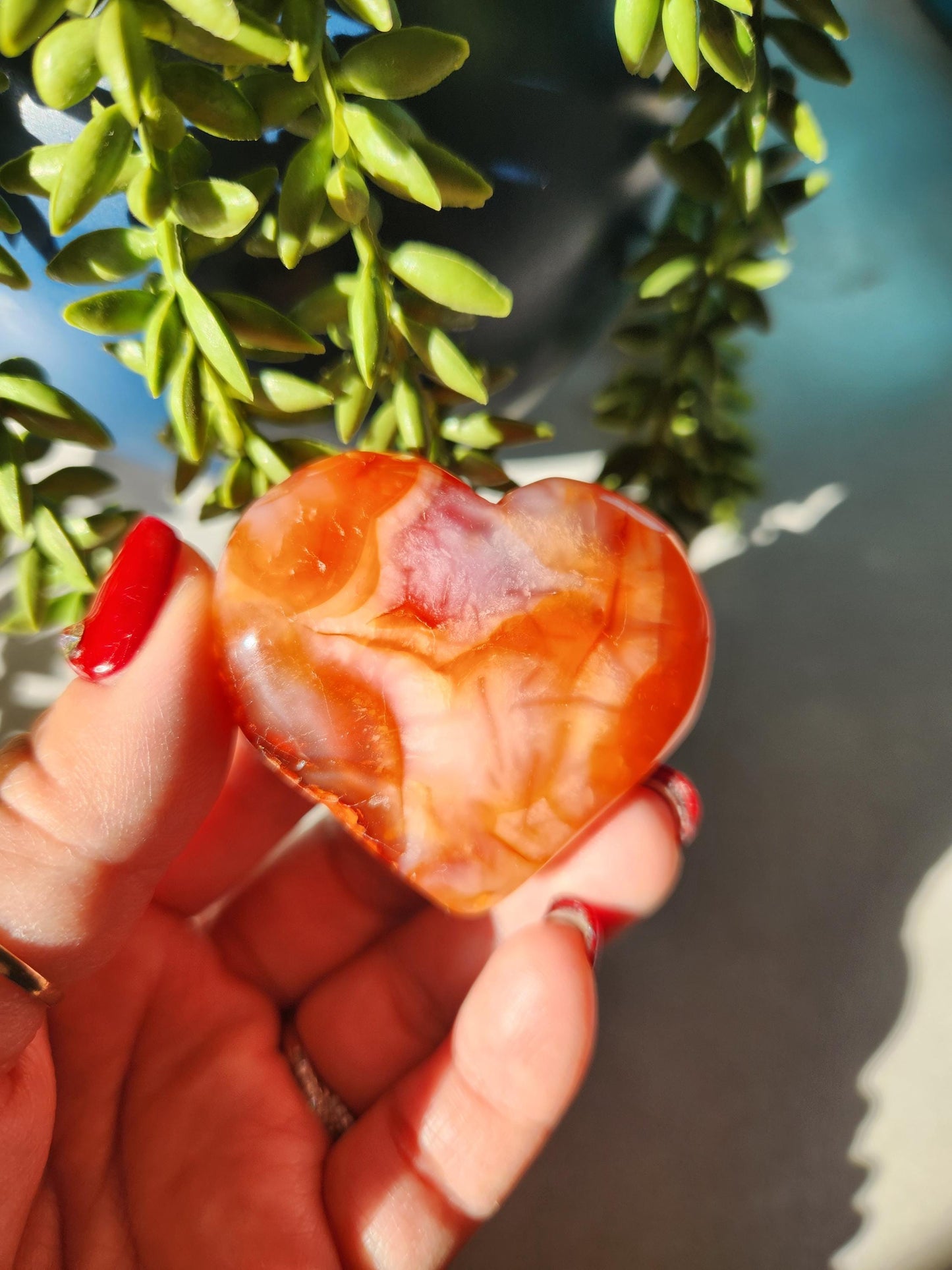 Beautiful carnelian heart carving from Madagascar with pretty patterns, natural
