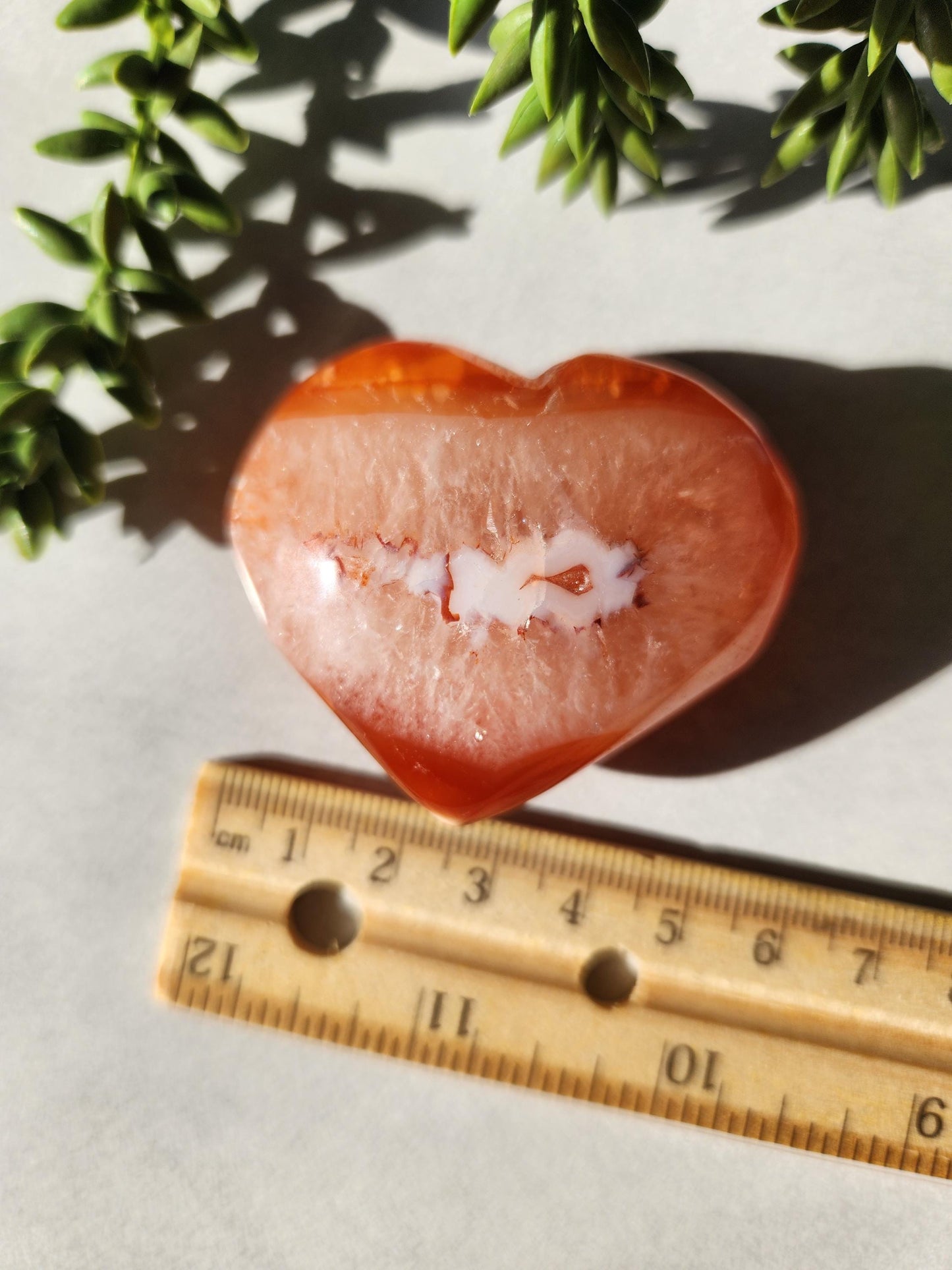 Gorgeous carnelian with quartz heart carving