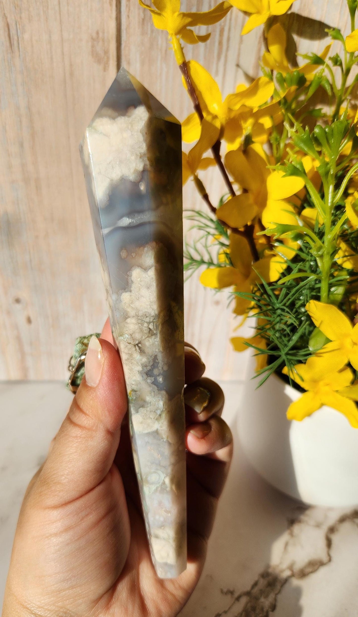 Natural black flower agate wand with stand, has quartz, black chalcedony, a touch of green, and beautiful agate banding from Madagascar