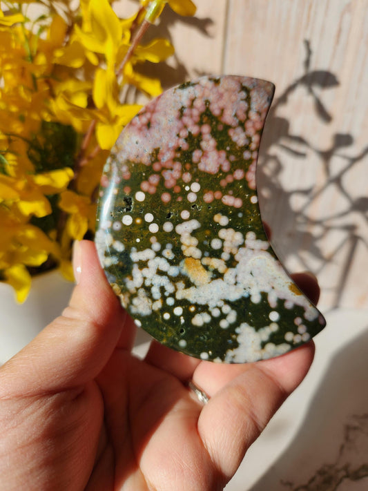 Pretty ocean jasper moon with beautiful colors, stand included