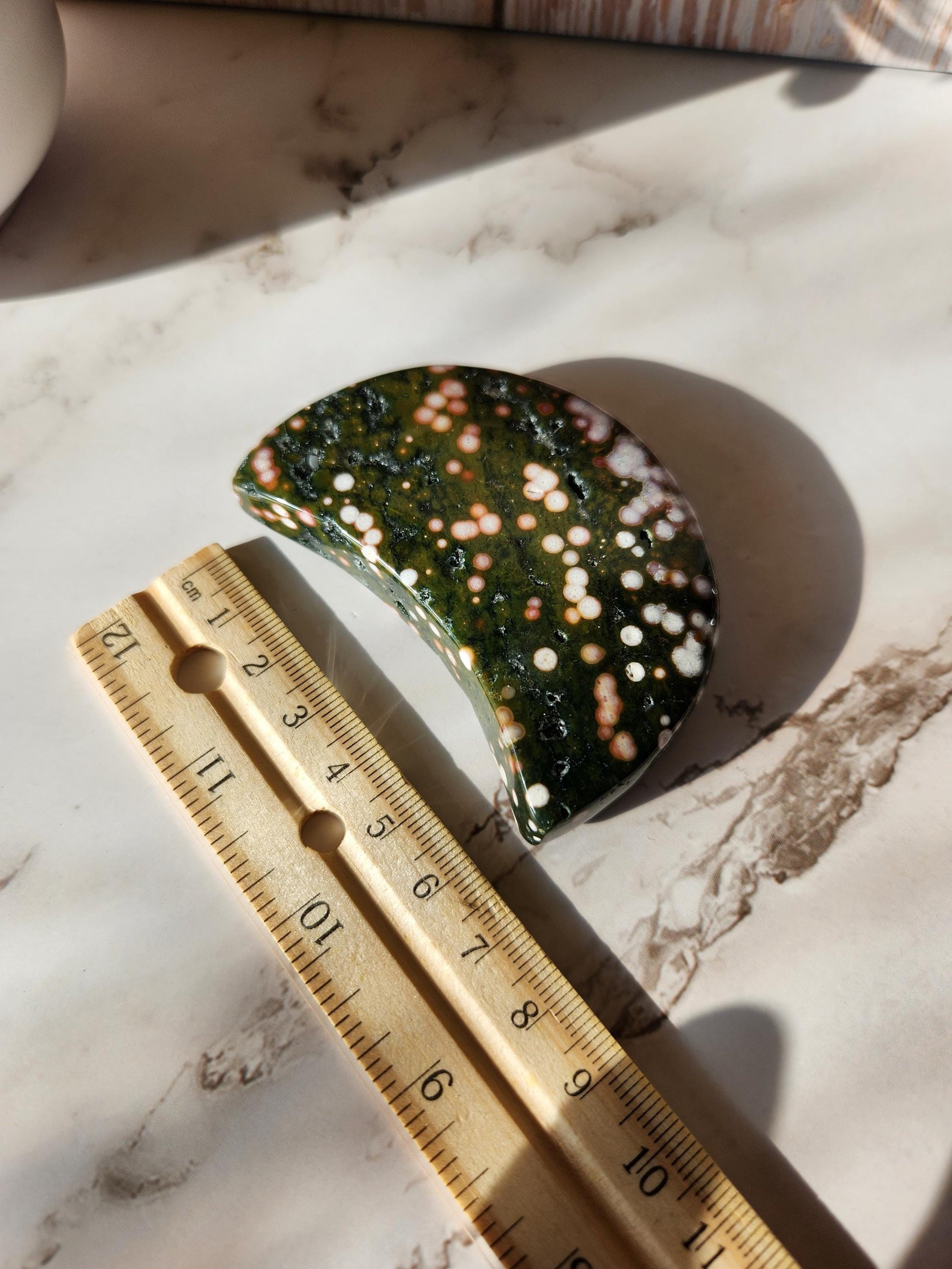Pretty ocean Jasper moon with sparkly small druzy pockets