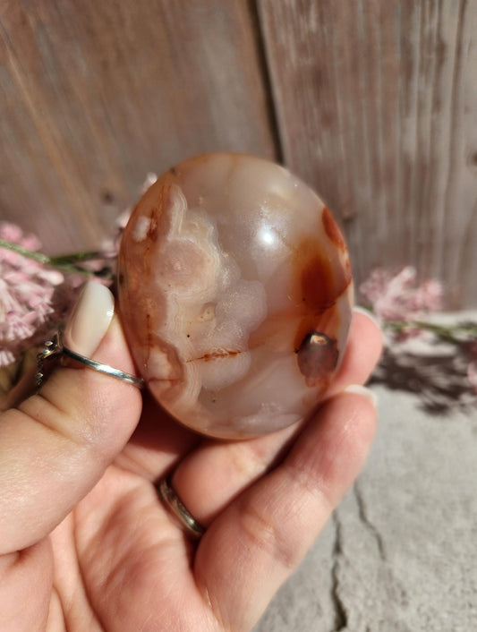 Amazing natural rare carnelian flower agate palm stone with pink flowers from Madagascar, cherry blossoms, translucent