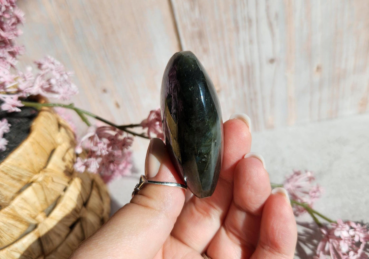 Amazing bright and silver white labradorite heart with with purple flash  from Finland