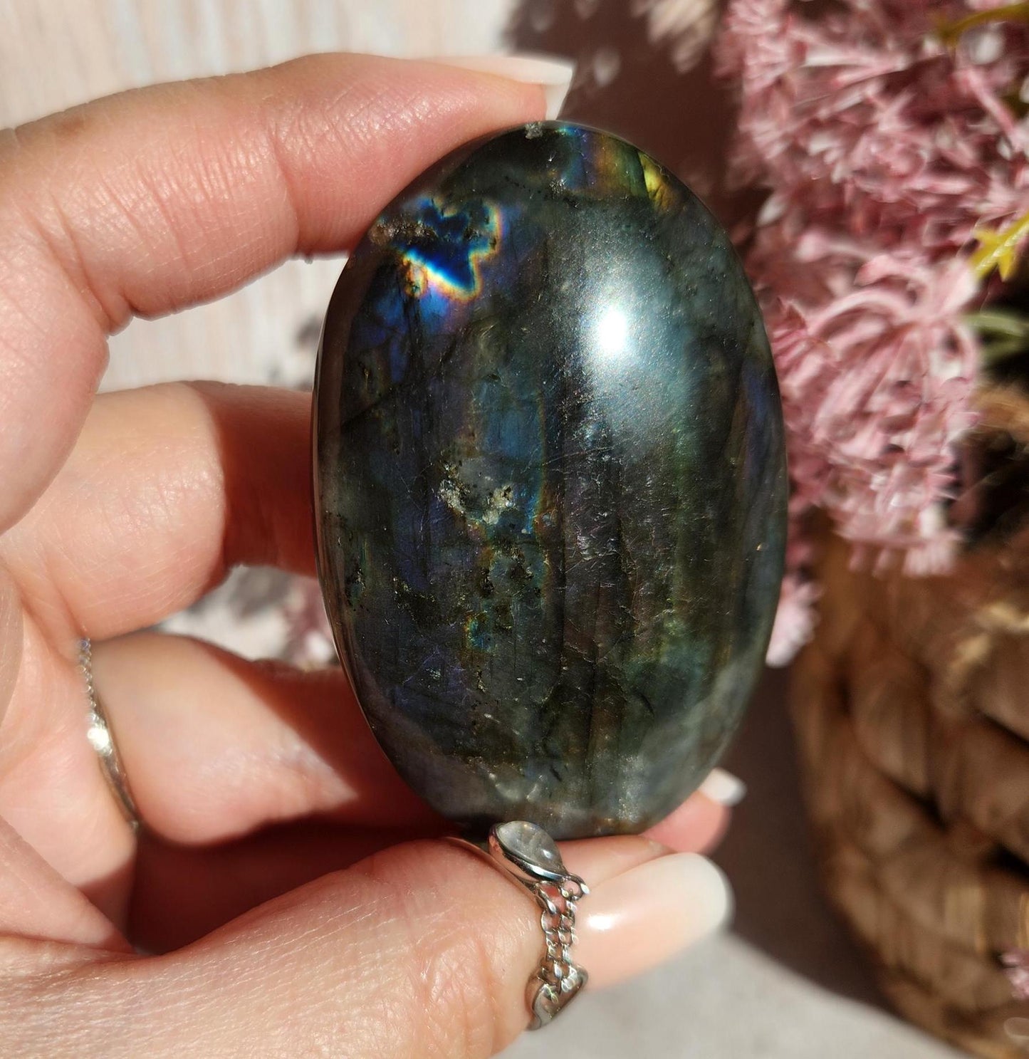 AAA Rainbow purple labradorite palm stone with silver sheen from Finland