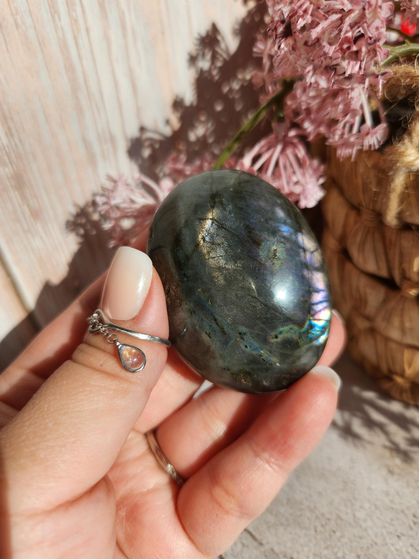 Stunning blue, silver purple labradorite palm stone from Finland