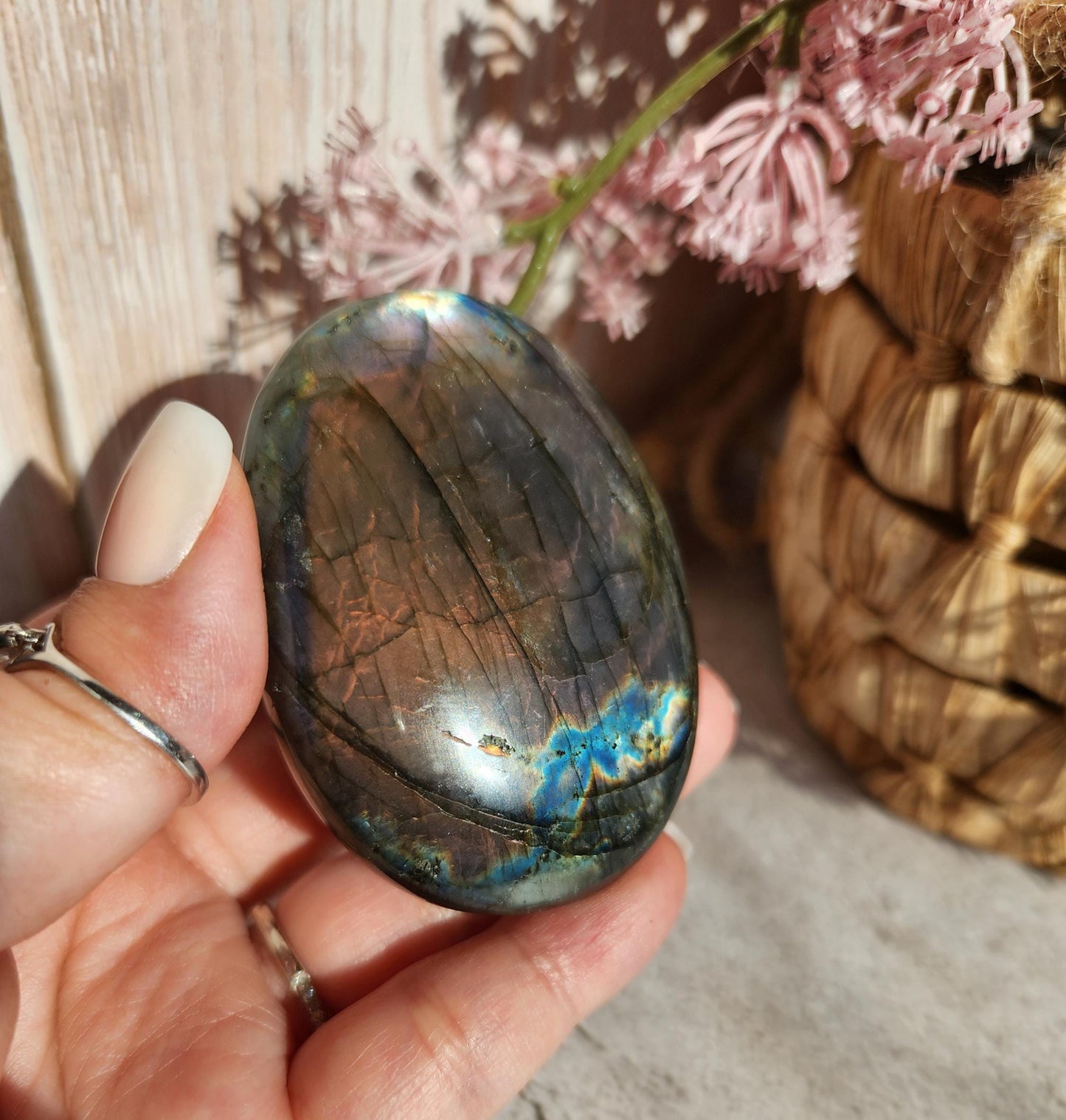 High quality XL dua flash labradorite, bright silver, orange, purple and blue flash labradorite palm stone from Finland
