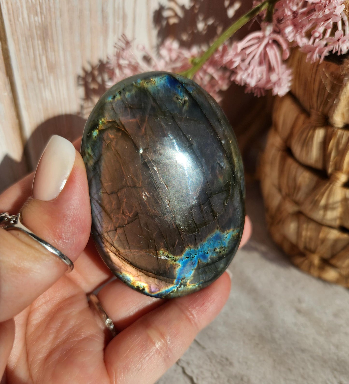High quality XL dua flash labradorite, bright silver, orange, purple and blue flash labradorite palm stone from Finland