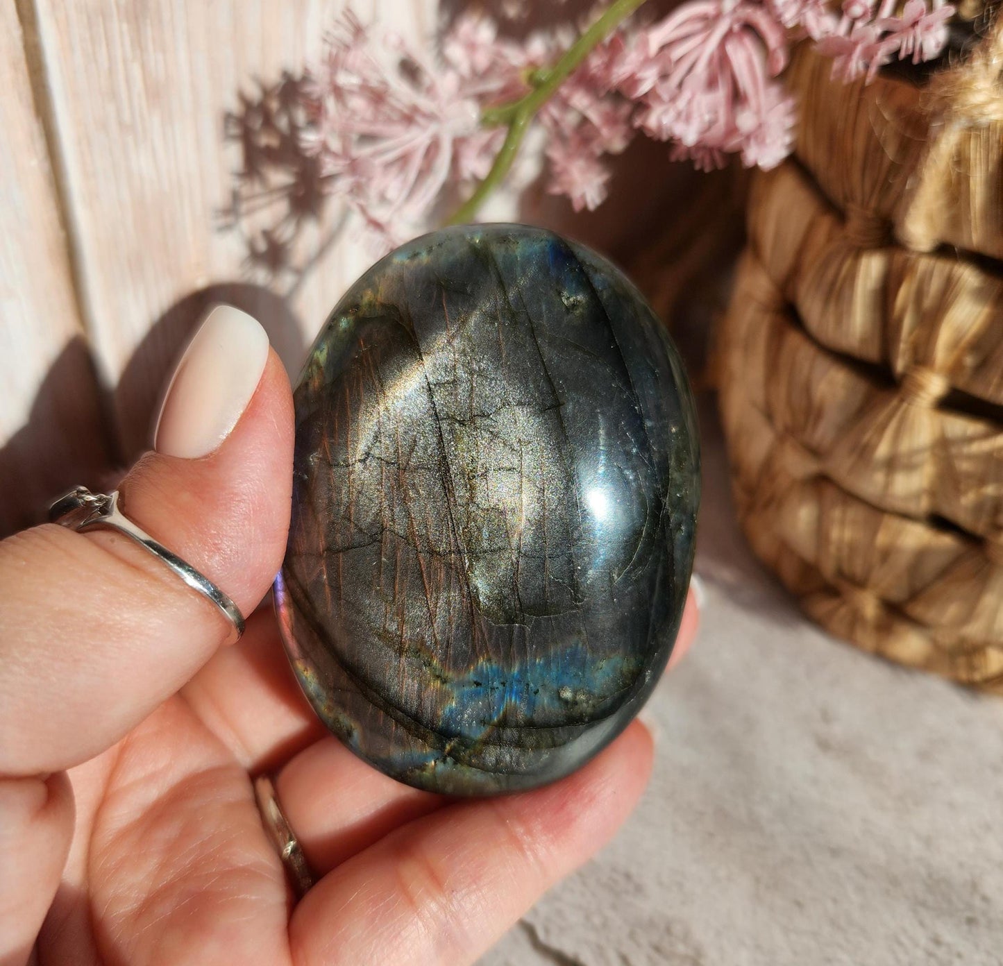 High quality XL dua flash labradorite, bright silver, orange, purple and blue flash labradorite palm stone from Finland