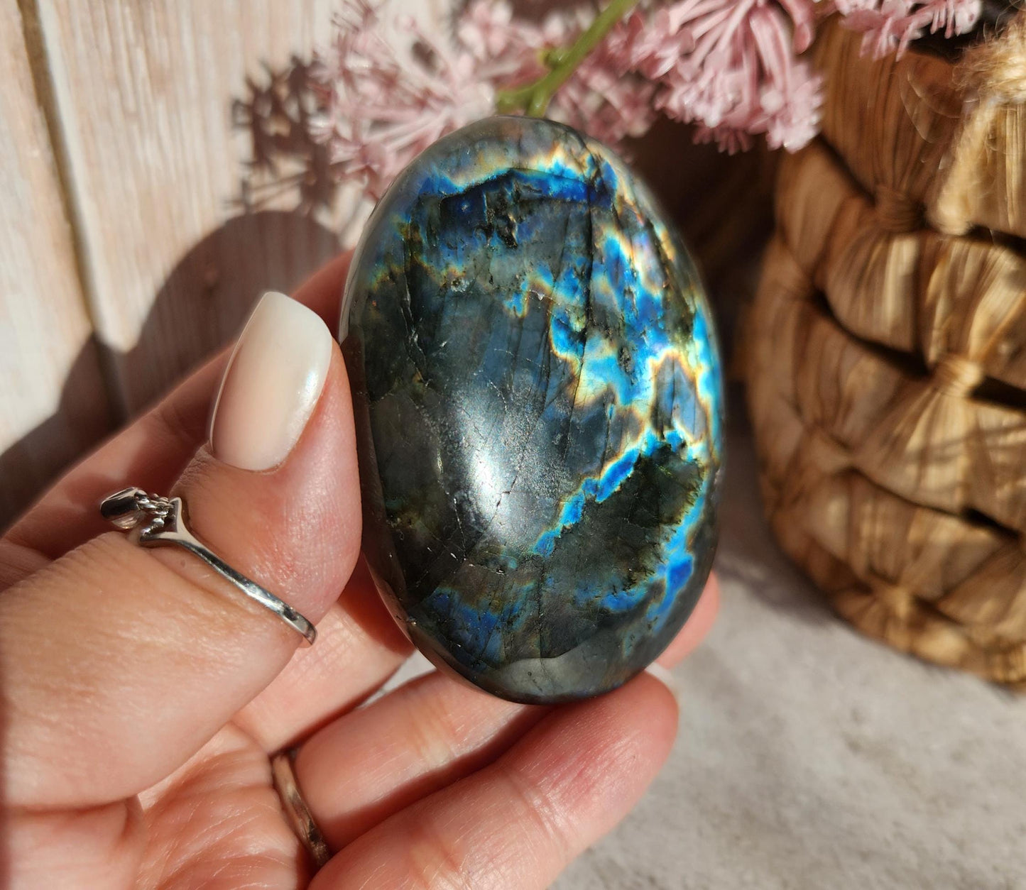High quality XL dua flash labradorite, bright silver, orange, purple and blue flash labradorite palm stone from Finland