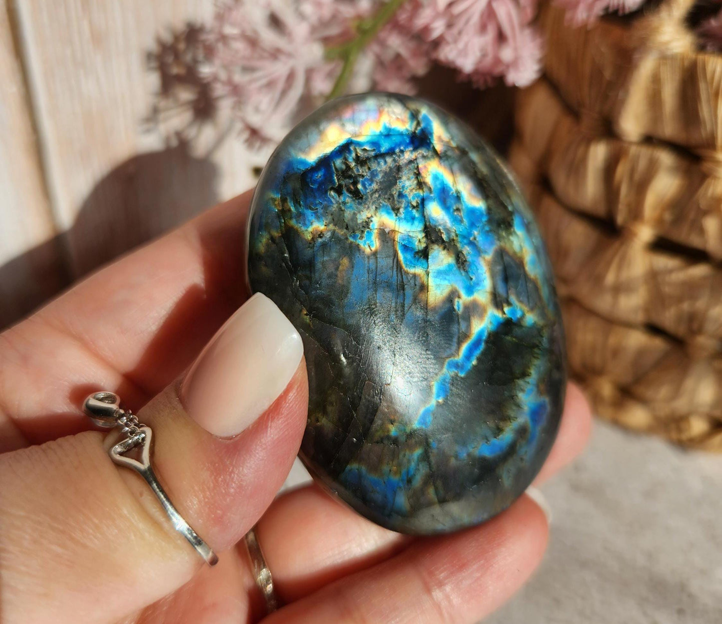High quality XL dua flash labradorite, bright silver, orange, purple and blue flash labradorite palm stone from Finland