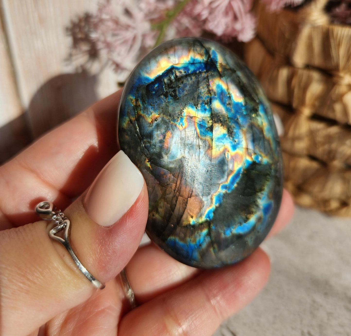 High quality XL dua flash labradorite, bright silver, orange, purple and blue flash labradorite palm stone from Finland
