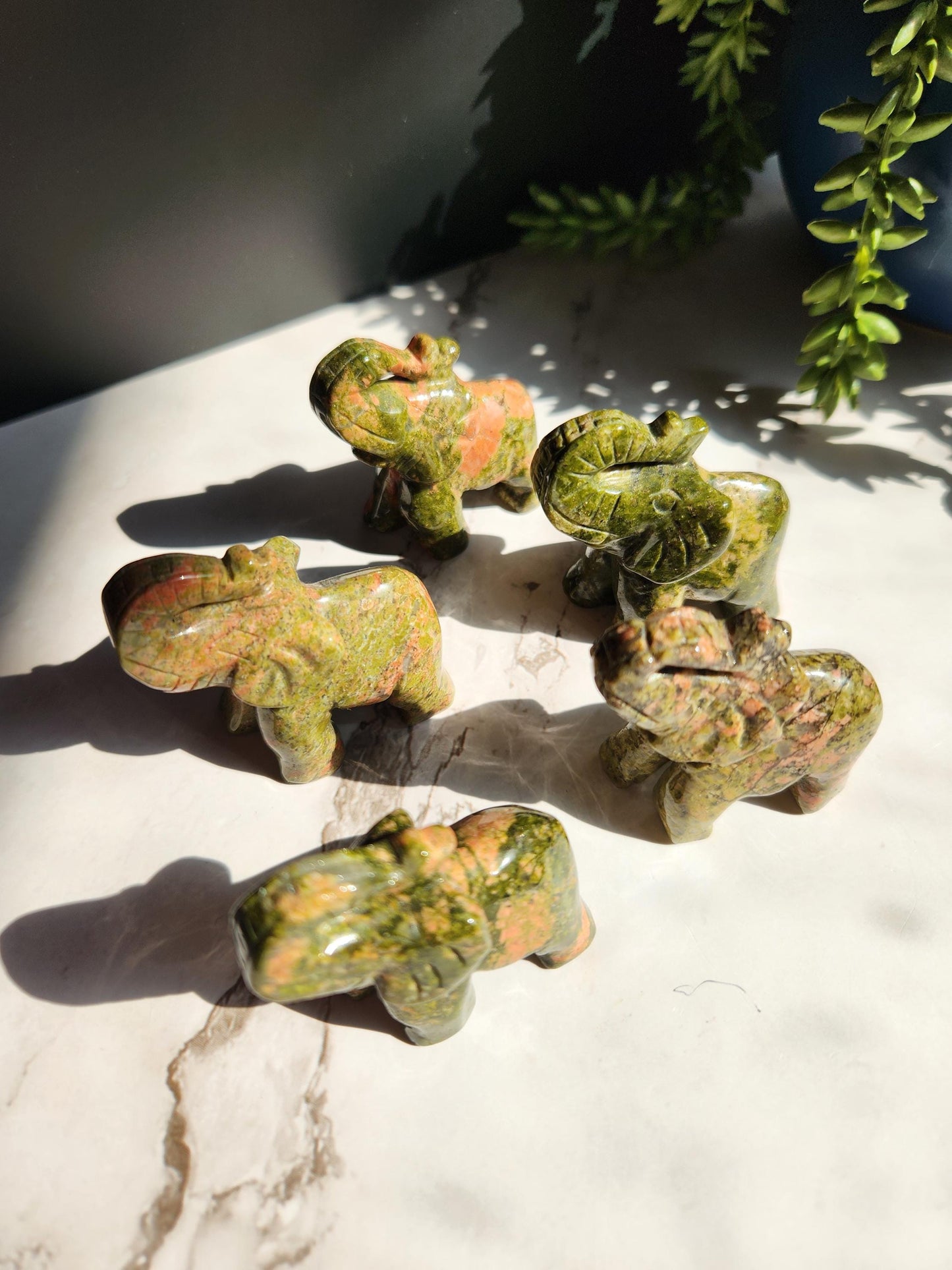 Beautiful hand carved unakite elephants, natural unakite