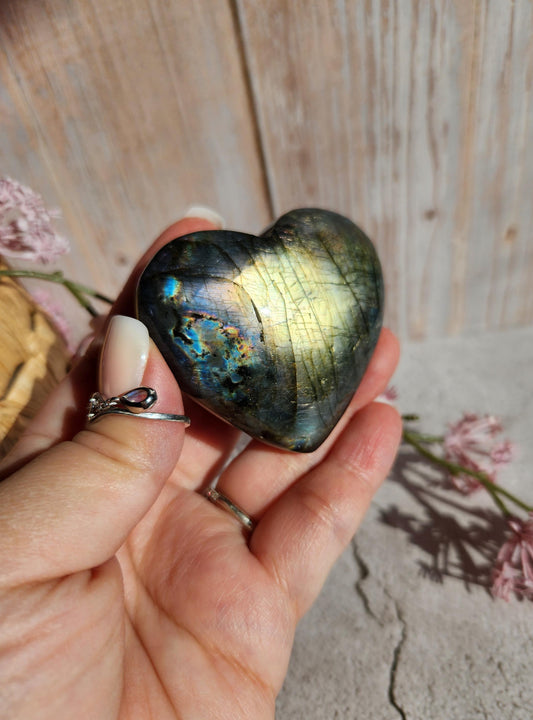 Amazing bright and silver white labradorite heart with with purple flash  from Finland