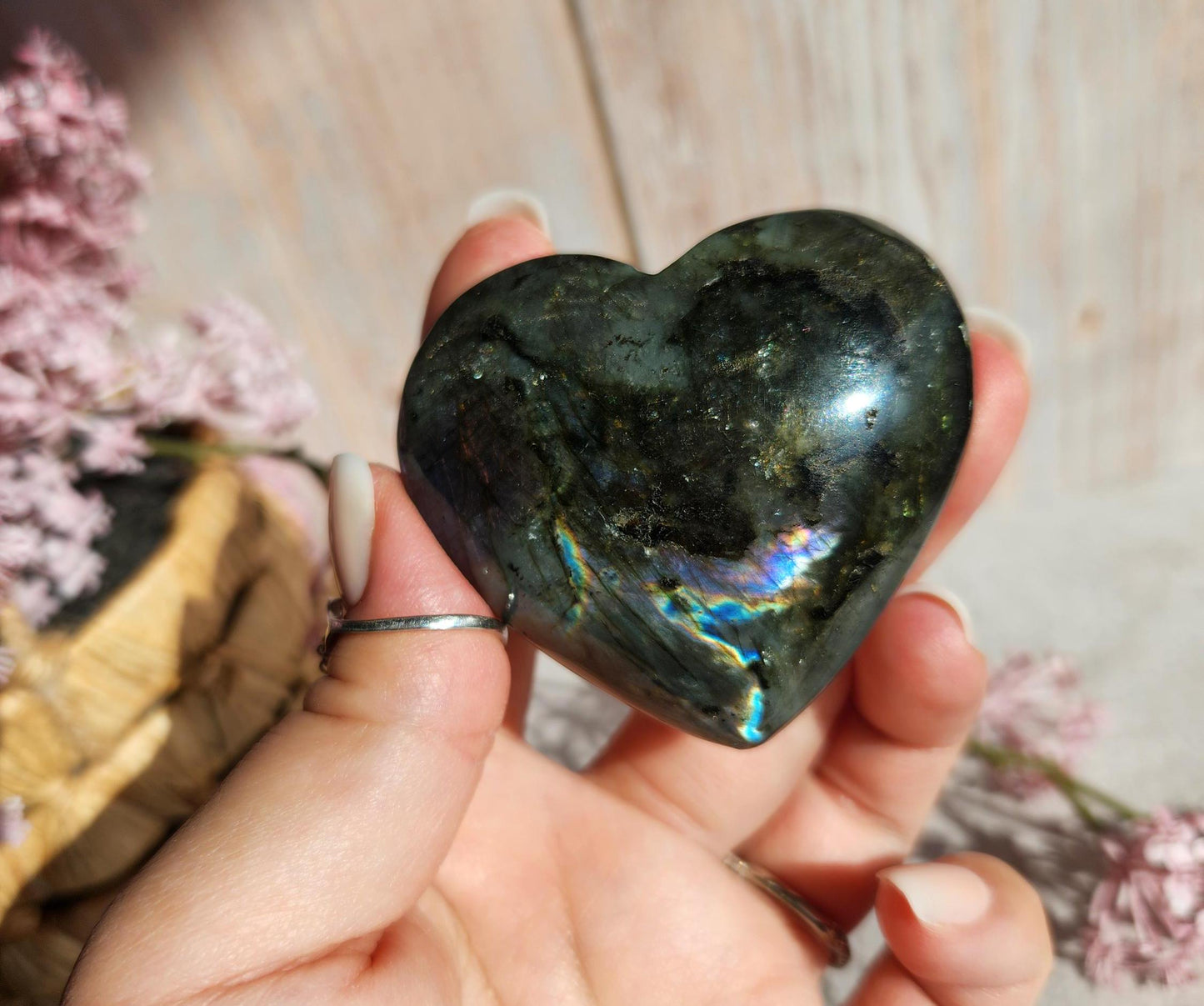 Amazing bright and silver white labradorite heart with with purple flash  from Finland