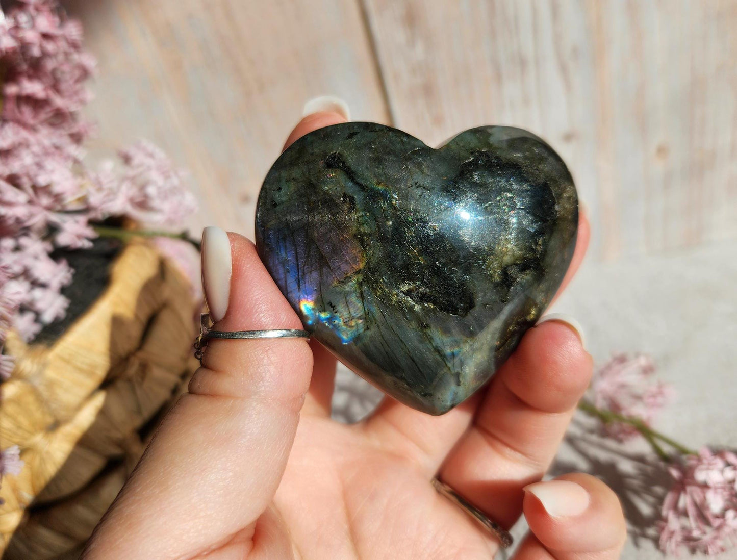 Amazing bright and silver white labradorite heart with with purple flash  from Finland