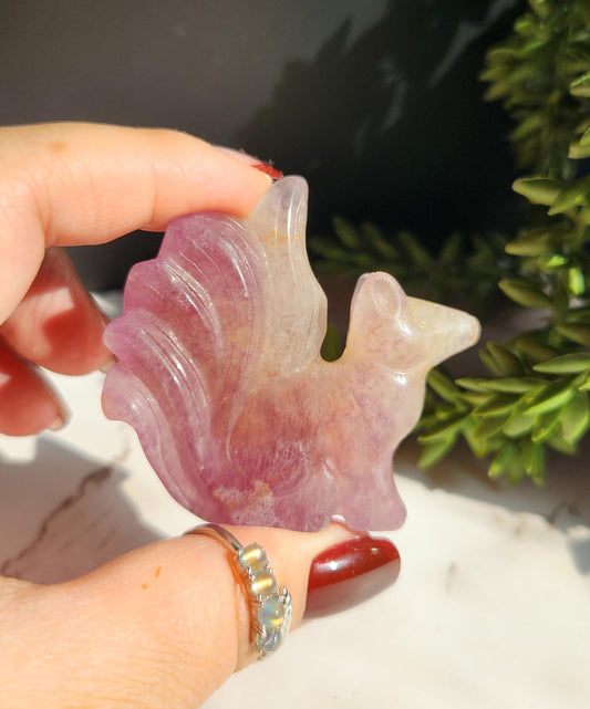 Natural fluorite 9 tail fox carving with golden healer inclusions