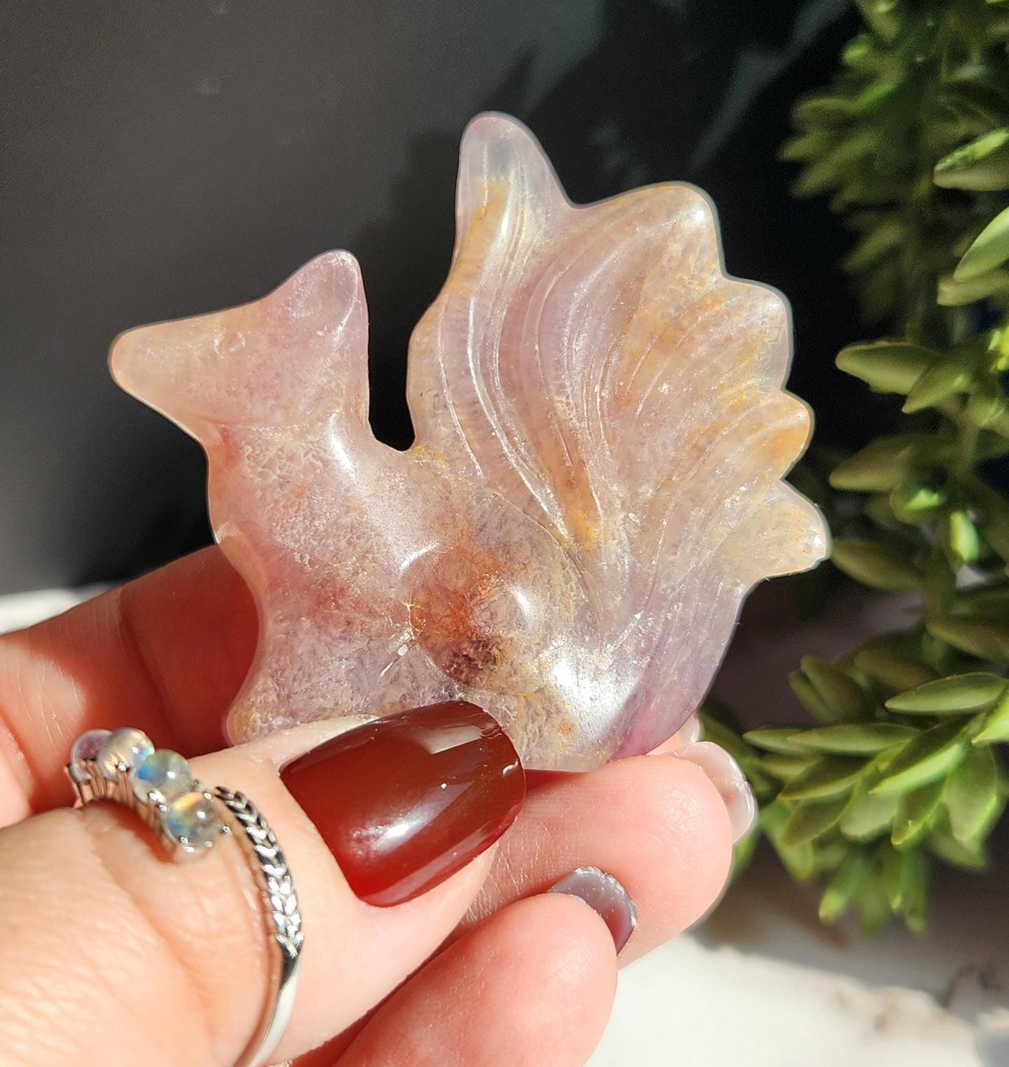 Natural fluorite 9 tail fox carving with golden healer inclusions