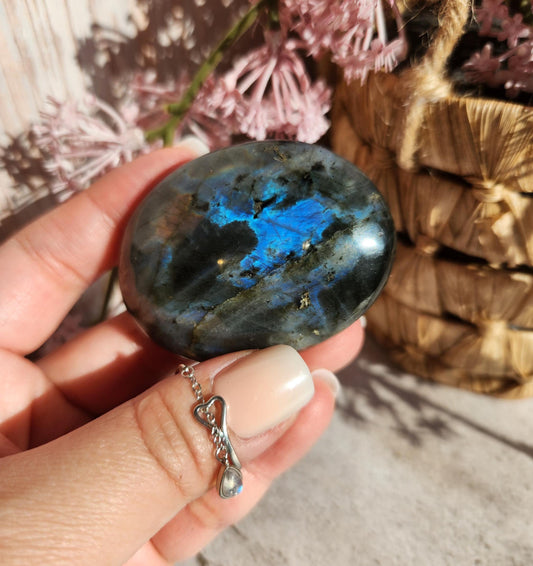 Stunning blue, silver purple labradorite palm stone from Finland