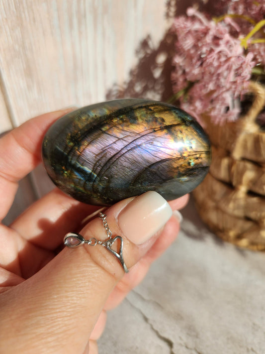 High quality dua flash labradorite, bright silver, orange and purple sunset labradorite palm stone from Finland