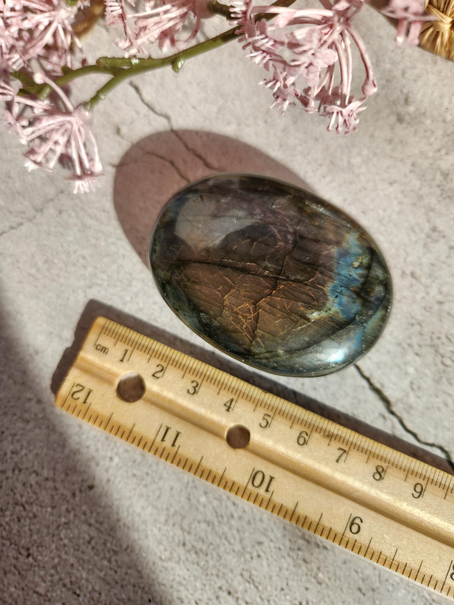 High quality XL dua flash labradorite, bright silver, orange, purple and blue flash labradorite palm stone from Finland