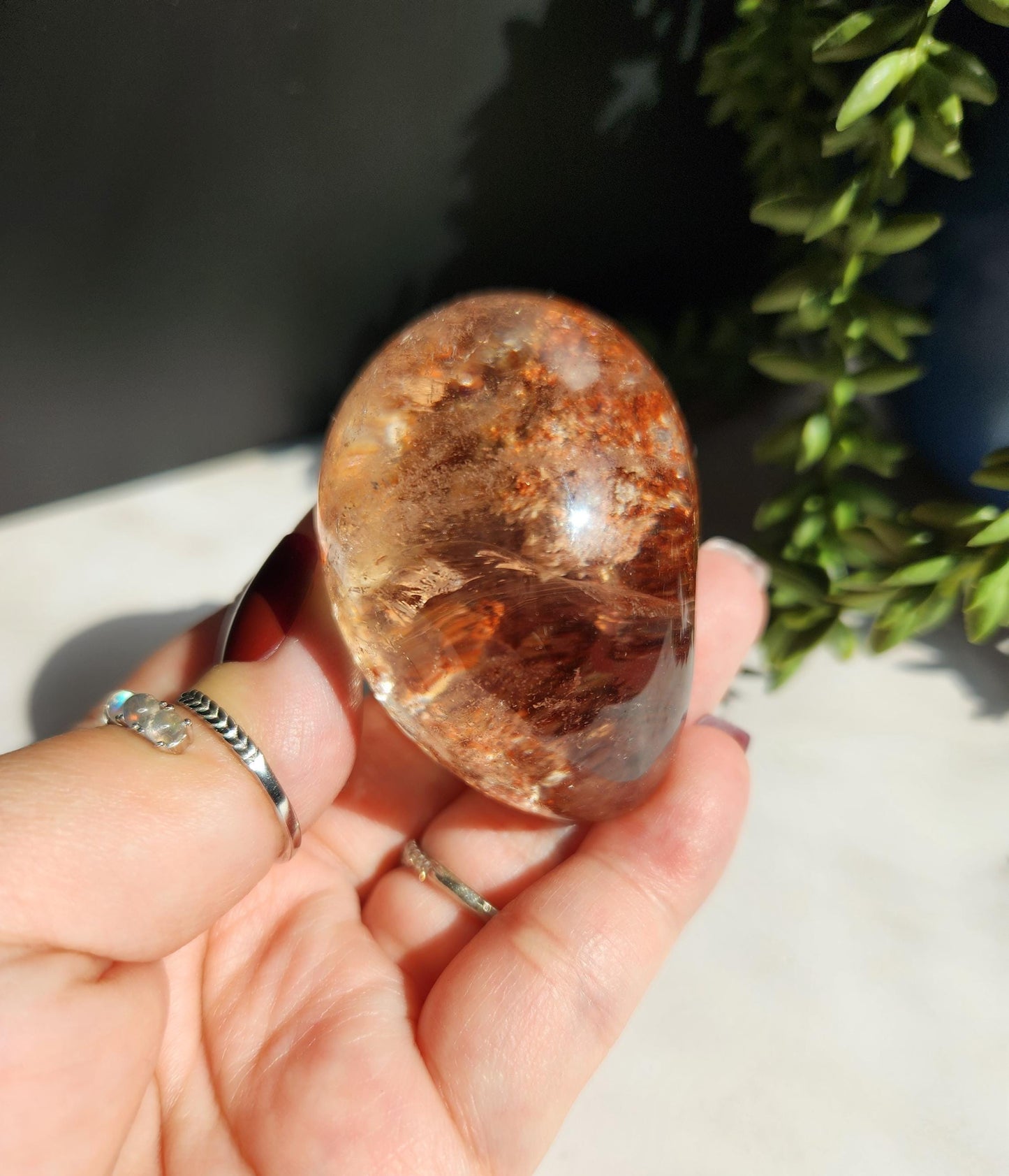Natural lodolite garden quartz lens from Brazil, half polish and half raw