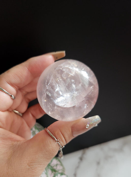 High quality 6 star rose quartz sphere with rainbows and asterism from Mozambique  Q40 R3