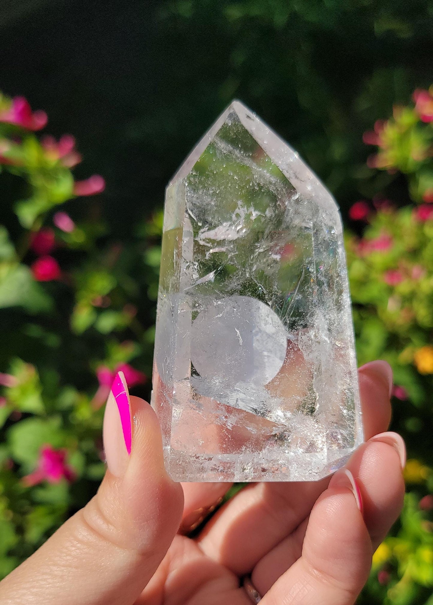 Beautiful high quality clear quartz tower with lots of rainbows from Brazil