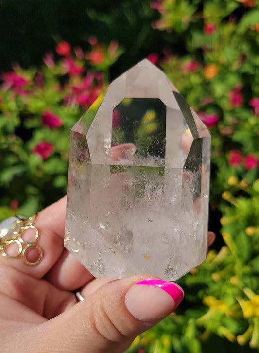Beautiful high quality light smoky quartz tower with lots of rainbows and iron inclusions from Brazil