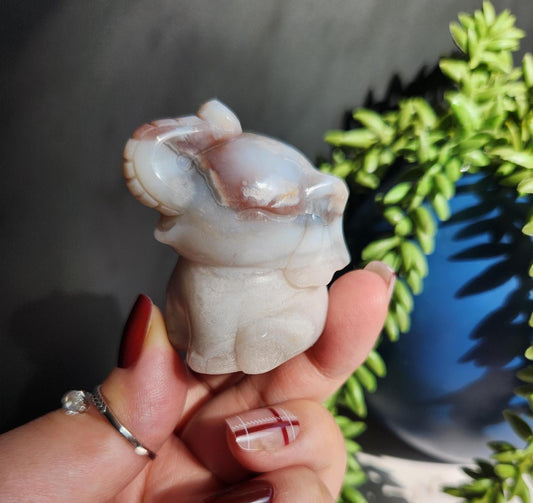 Beautiful happy hand carved carnelian flower agate elephant with black chalcedony, natural