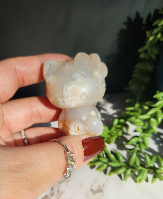 Beautiful flower agate hello kitty carving with a druzy, natural