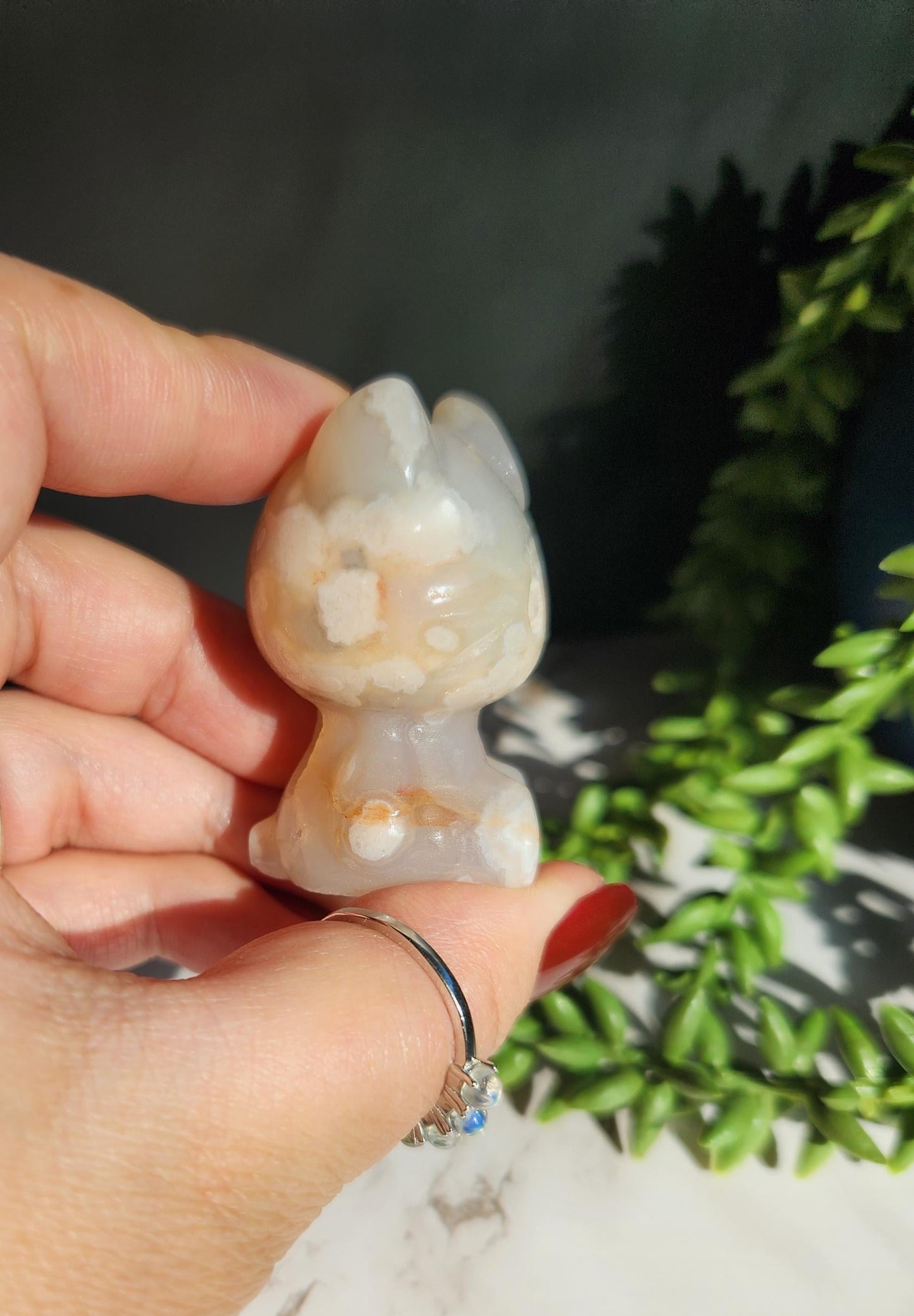 Beautiful flower agate hello kitty carving with a druzy, natural