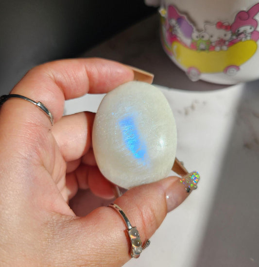 High quality blue moonstone palm stone with white and blue flash from Madagascar  A24