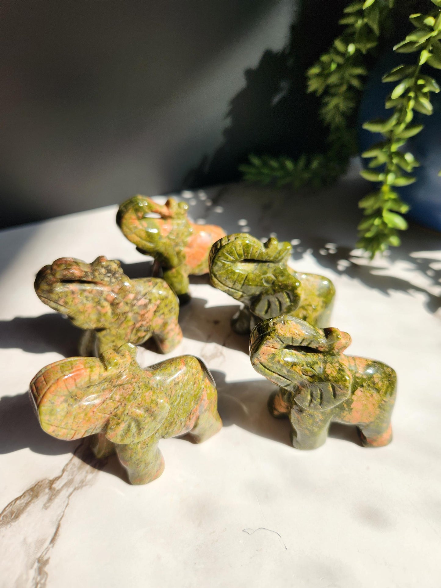 Beautiful hand carved unakite elephants, natural unakite